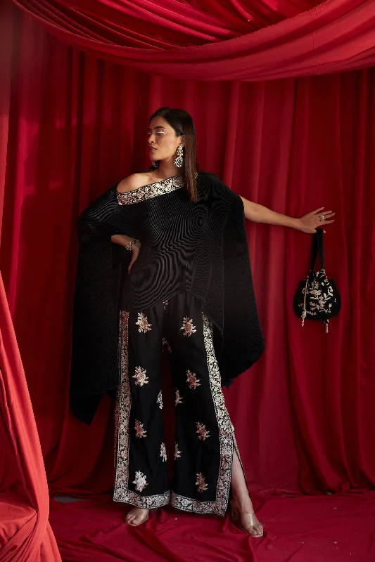 Reyna Gara Glazed Embroidered Pleated Cape Coordinated with Slit Pants - Black Stylish Slim Trousers Stylish Slim Trousers Reyna Gara Glazed Embroidered Pleated Cape Coordinated with Slit Pants - Black Stylish Slim Trousers Stylish Slim Trousers